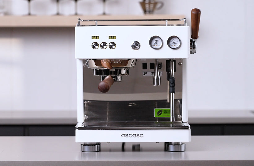 Ascaso Baby T Plus espresso machine in white on a kitchen counter