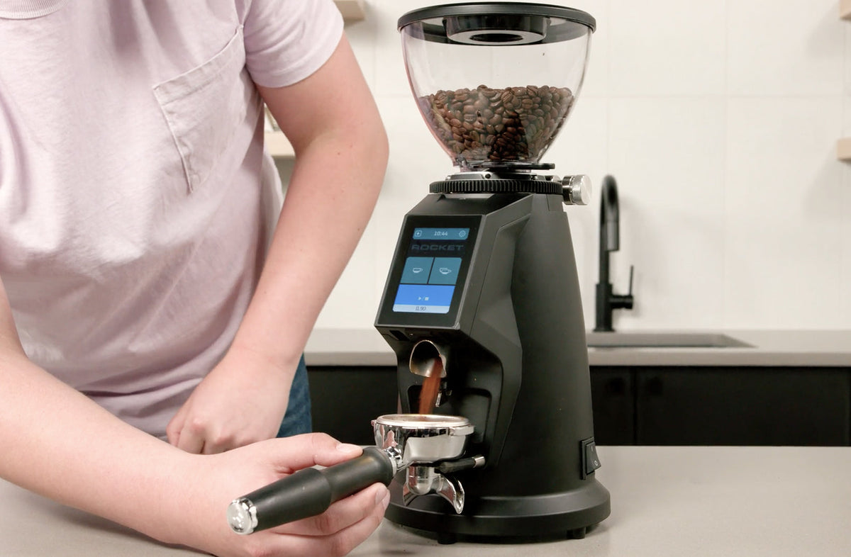 Rocket Espresso Spluga grinder dispensing espresso grounds into a portafilter - Seattle Coffee Gear