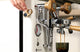 LELIT Mara X3 pulling espresso while a hand adjusts the Pagaia flow profiling paddle